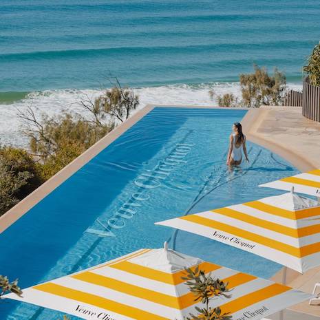 The pool at Hotel Clicquot Australia in Noosa, Queensland. Image credit: Surfing in 2022 at Sunshine Beach in Noosa, Queensland at the first Hotel Clicquot Australia popup. Image credit: ©ARR