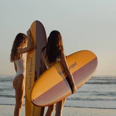 Surfing in 2022 at Sunshine Beach in Noosa, Queensland at the first Hotel Clicquot Australia popup. Image credit: ©ARR