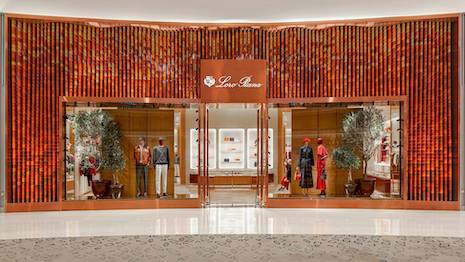 The newly relaunched Loro Piana store façade in the Dubai Mall, Dubai, UAE. The store is the first in the Loro Piana network to sport a new design layout geared to welcoming wealthy and UHNW clients in a private setting with exclusive merchandise. Image credit: ©ARR 