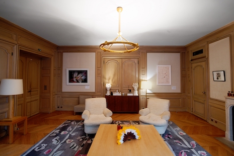 Art from "The Flowers of Evil" exhibition on the walls of the Paris flagship store of Guerlain. Image: ©ARR, Guerlain 