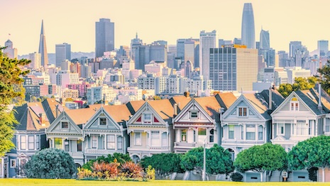 San Francisco is still a favorite investment option for international property buyers, especially from China, Canada and the United Kingdom. Seen here: Victorian houses in San Francisco's Alamo Square with the city skyline in the background